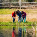 Kids exploring a lake